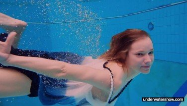 teen,underwater,swimming,pool,poolside,sport,bathing,water,solo girl,softcore,redhead,european