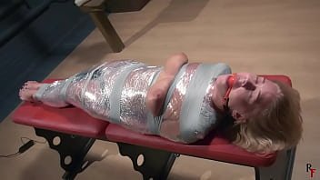 topless,mummification,ballgagged,bondage-device,wrapped-girl
