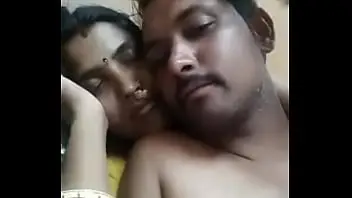 indian-couple,cosy-snuggy,wife-holding-hubby-from-behind